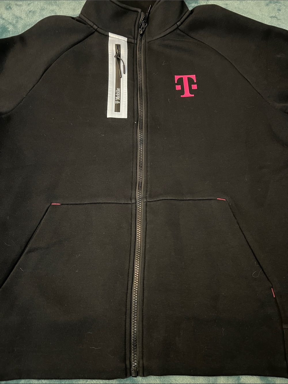 T-Mobile Black Zip-Up jacket  with Pink Logo , good condition, size M